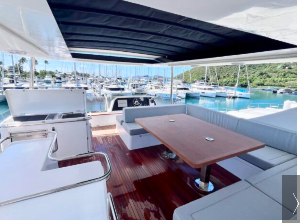 Yachti By Nature aft cockpit outdoor dining area for BVI yacht charter guests
