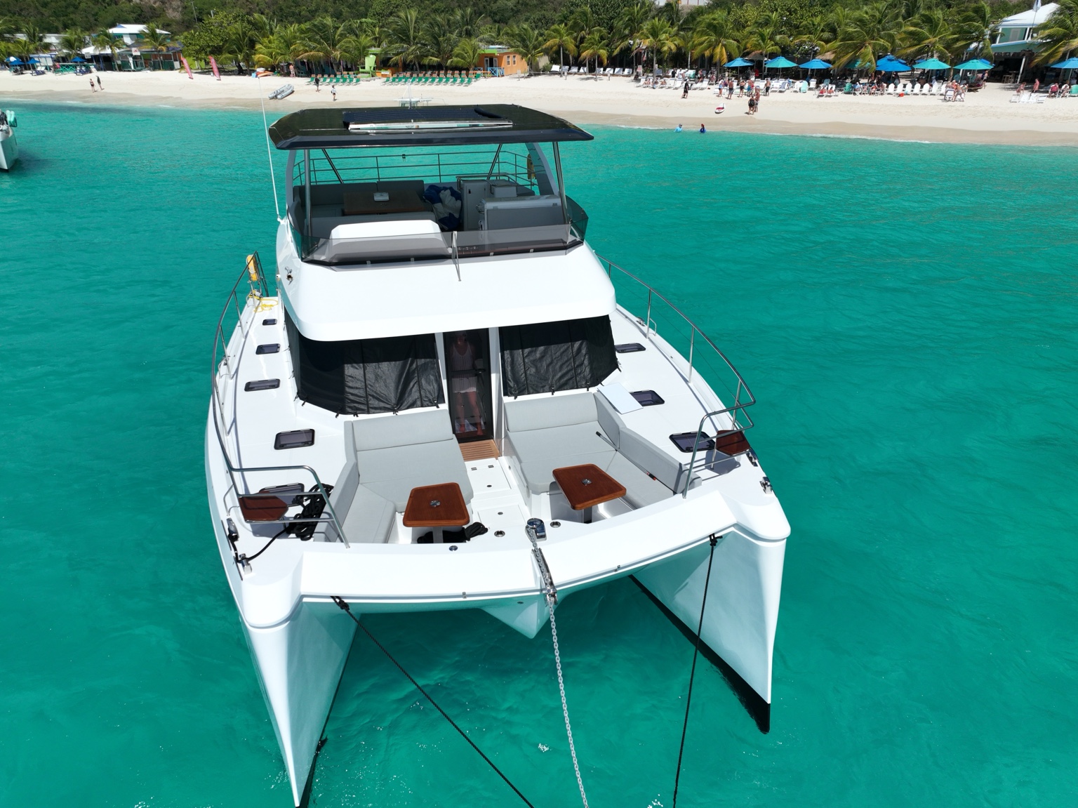 Yachti By Nature luxury Aventura 50 power catamaran bow view anchored in turquoise British Virgin Islands water